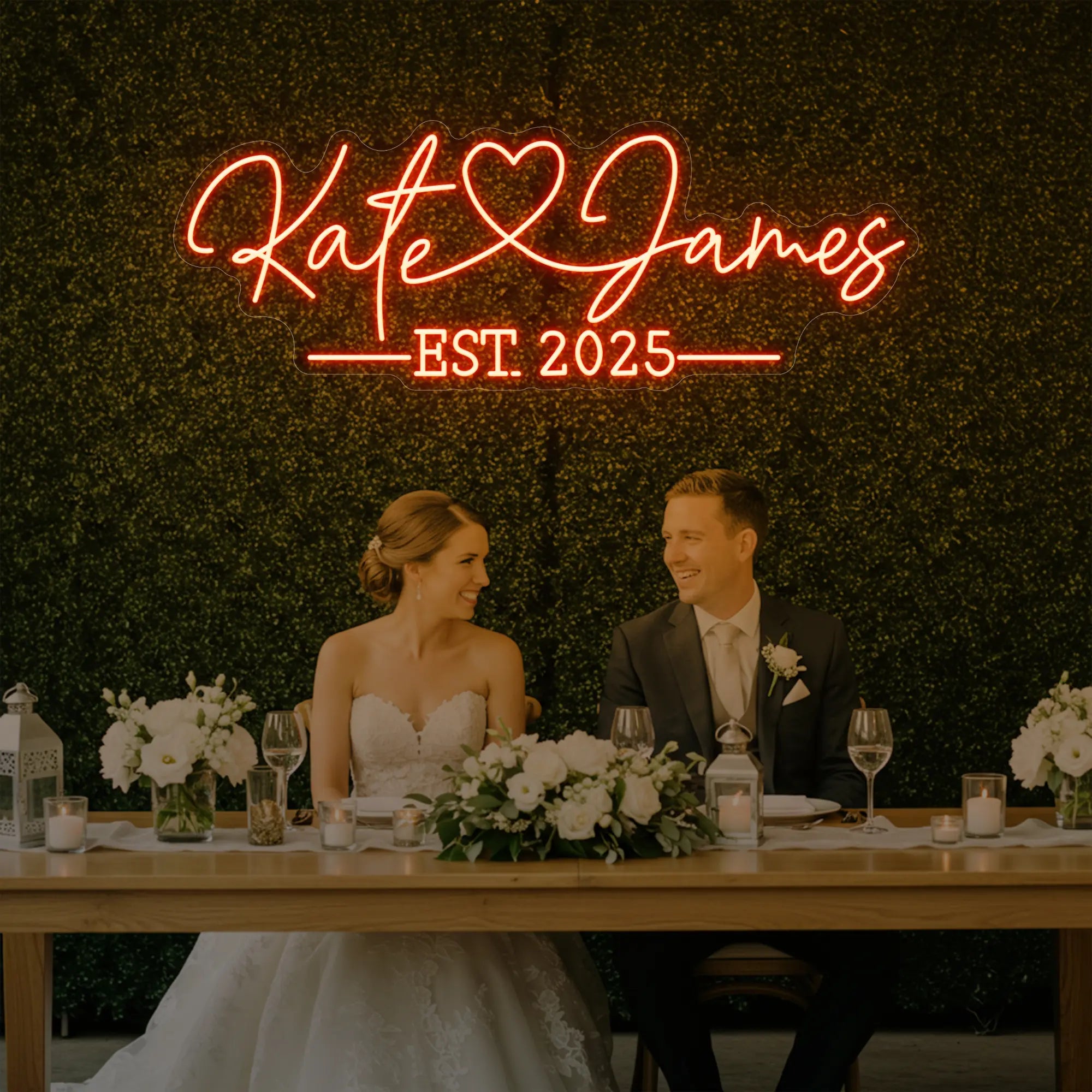 Photo of the 'Wedding Names Custom Neon Sign' neon sign glowing in golden yellow against a styled interior wall.