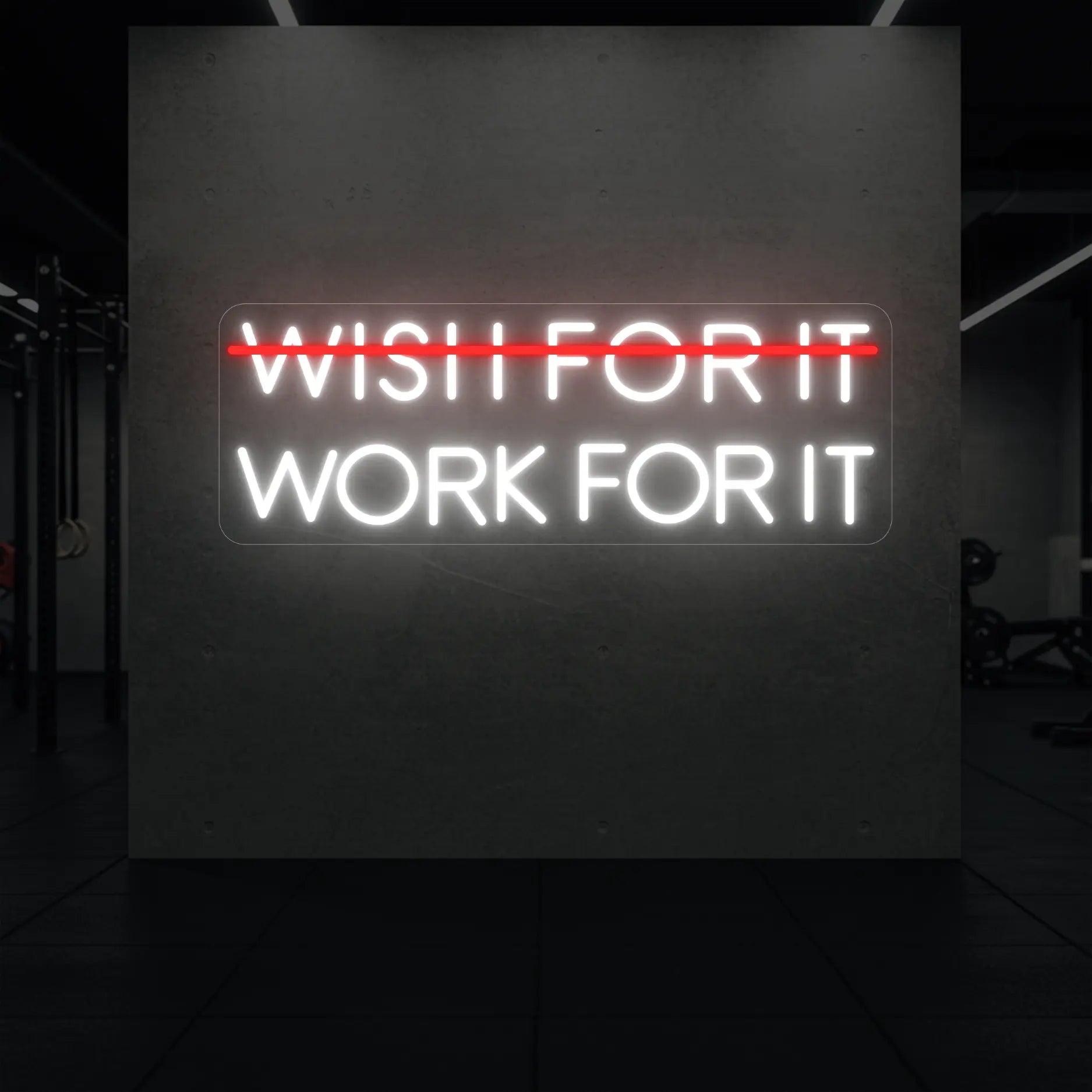 Photo of the 'WISH FOR IT WORK FOR IT' neon sign glowing in red and cool white against a styled interior wall.