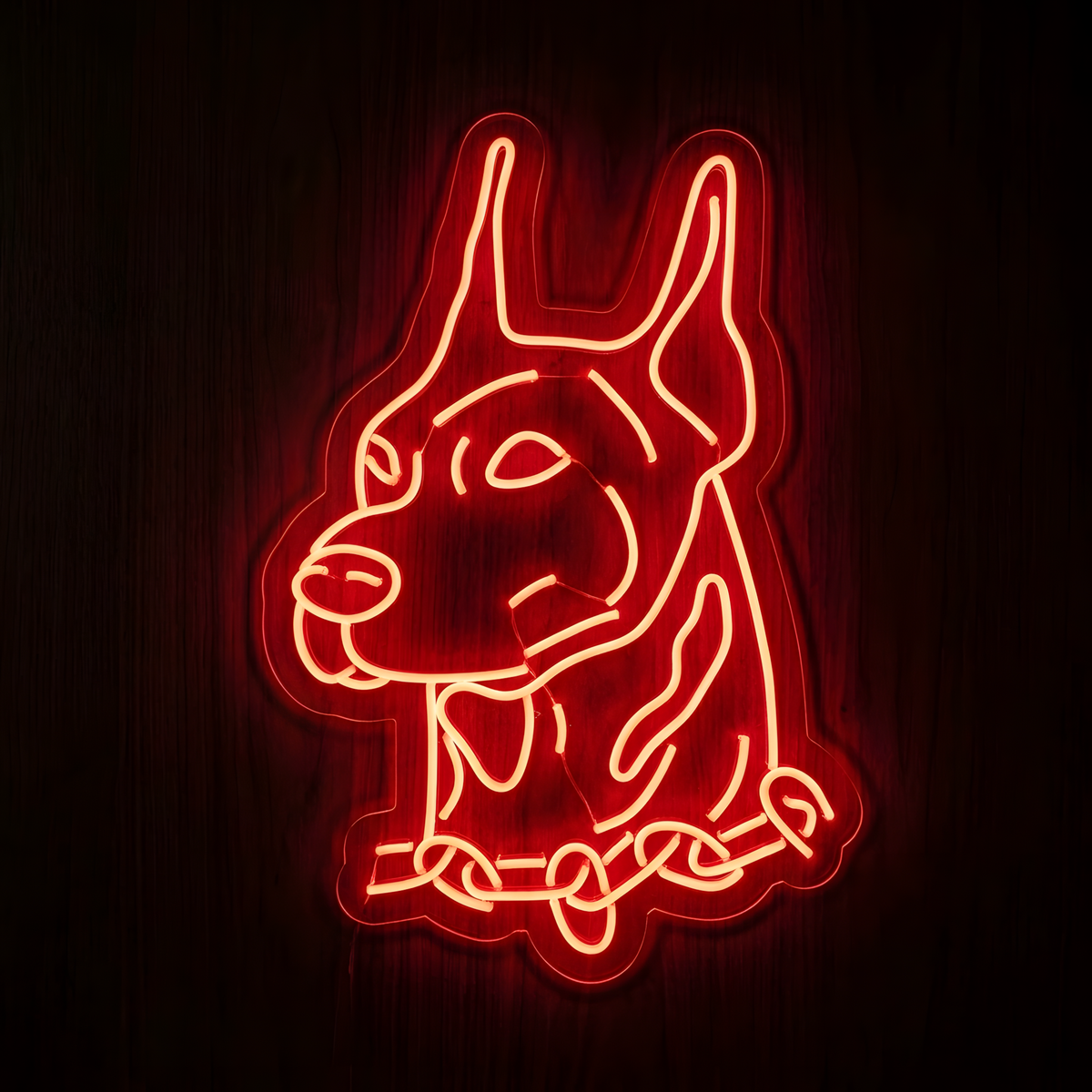 Doberman Dog LED Neon Sign featuring a vivid red-orange outline portrait of a Doberman with upright ears and detailed facial features on clear cut-to-shape acrylic against a dark wood background, ideal for dog lovers, pet rooms, grooming salons, and veterinary spaces.