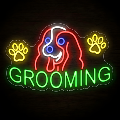 Happy Dog Grooming LED Neon Sign featuring a cheerful red and white dog face, yellow paw prints, blue facial details, and bright green GROOMING lettering on clear acrylic backing, designed for dog grooming salons, pet spas, professional groomers, pet boutiques, and animal care businesses