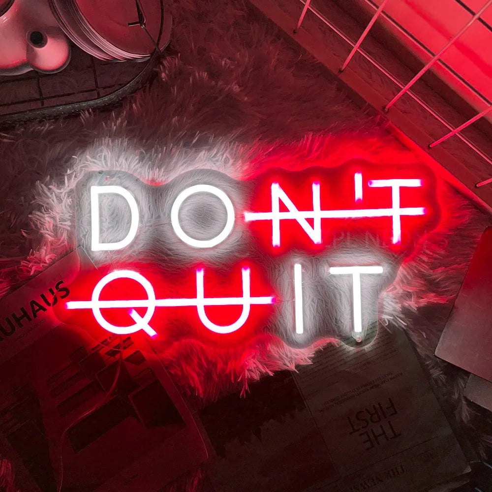 Red "DON'T QUIT" neon sign