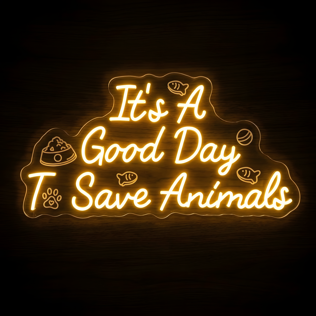 Save Animals Quote LED Neon Sign featuring the glowing phrase It’s A Good Day To Save Animals with paw print, pet food bowl, fish and ball details on clear acrylic backing against a dark wood wall.