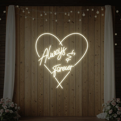 Photo of the 'Always & Forever' neon sign glowing in warm white against a styled interior wall.