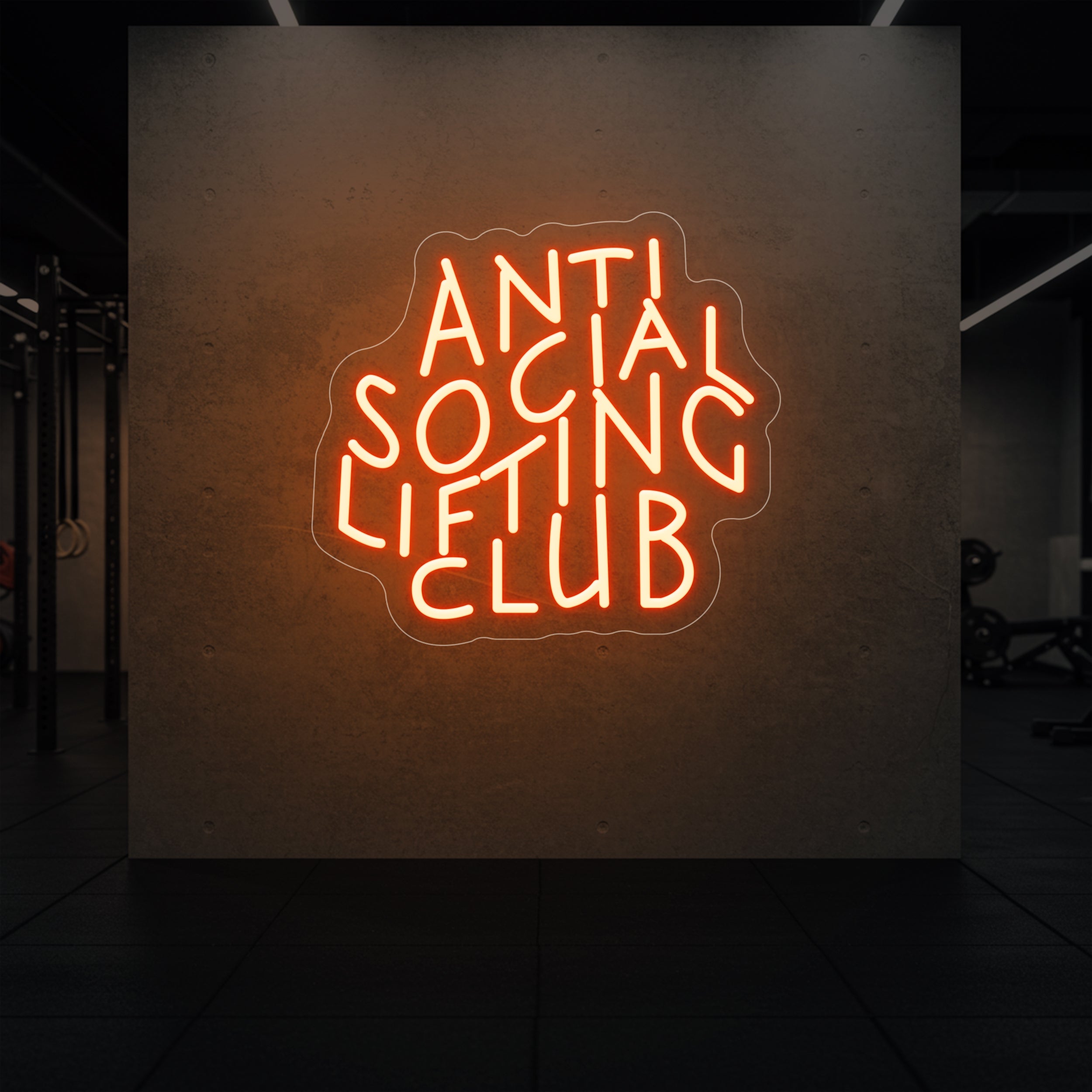  'Anti Social Lifting Club' neon sign glowing in golden yellow against a styled interior wall.