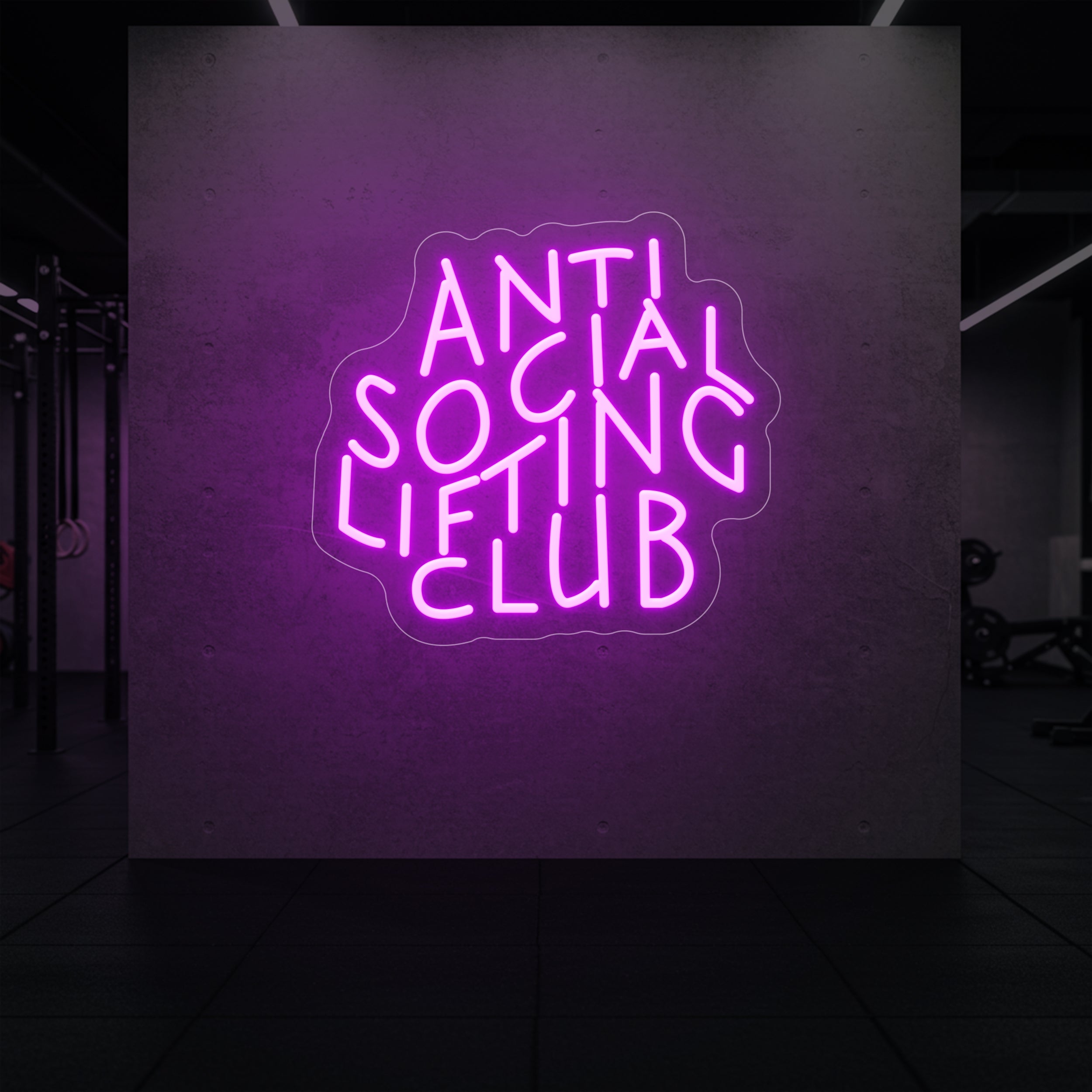 'Anti Social Lifting Club' neon sign glowing in deep pink against a styled interior wall.