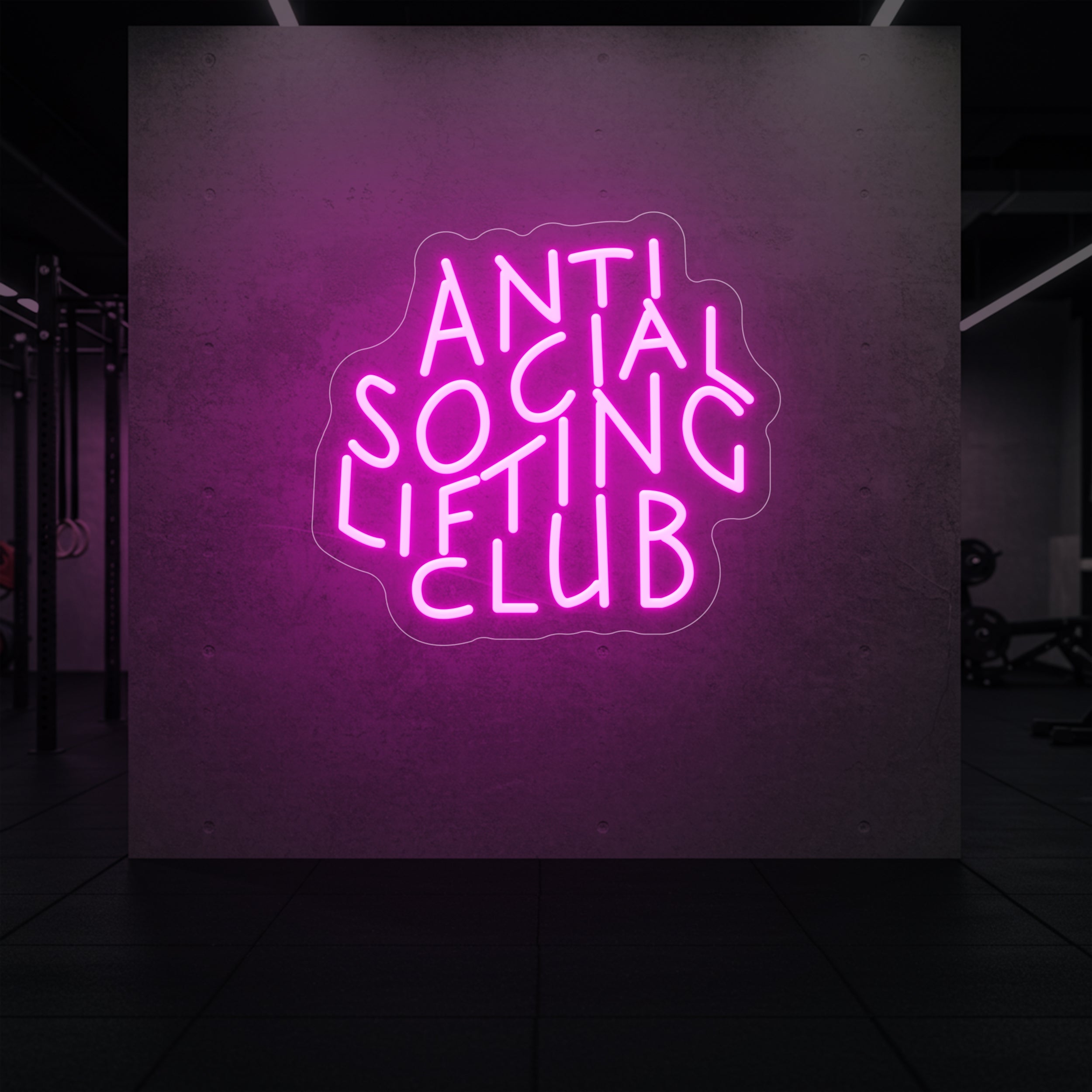  'Anti Social Lifting Club' neon sign glowing in light pink against a styled interior wall.
