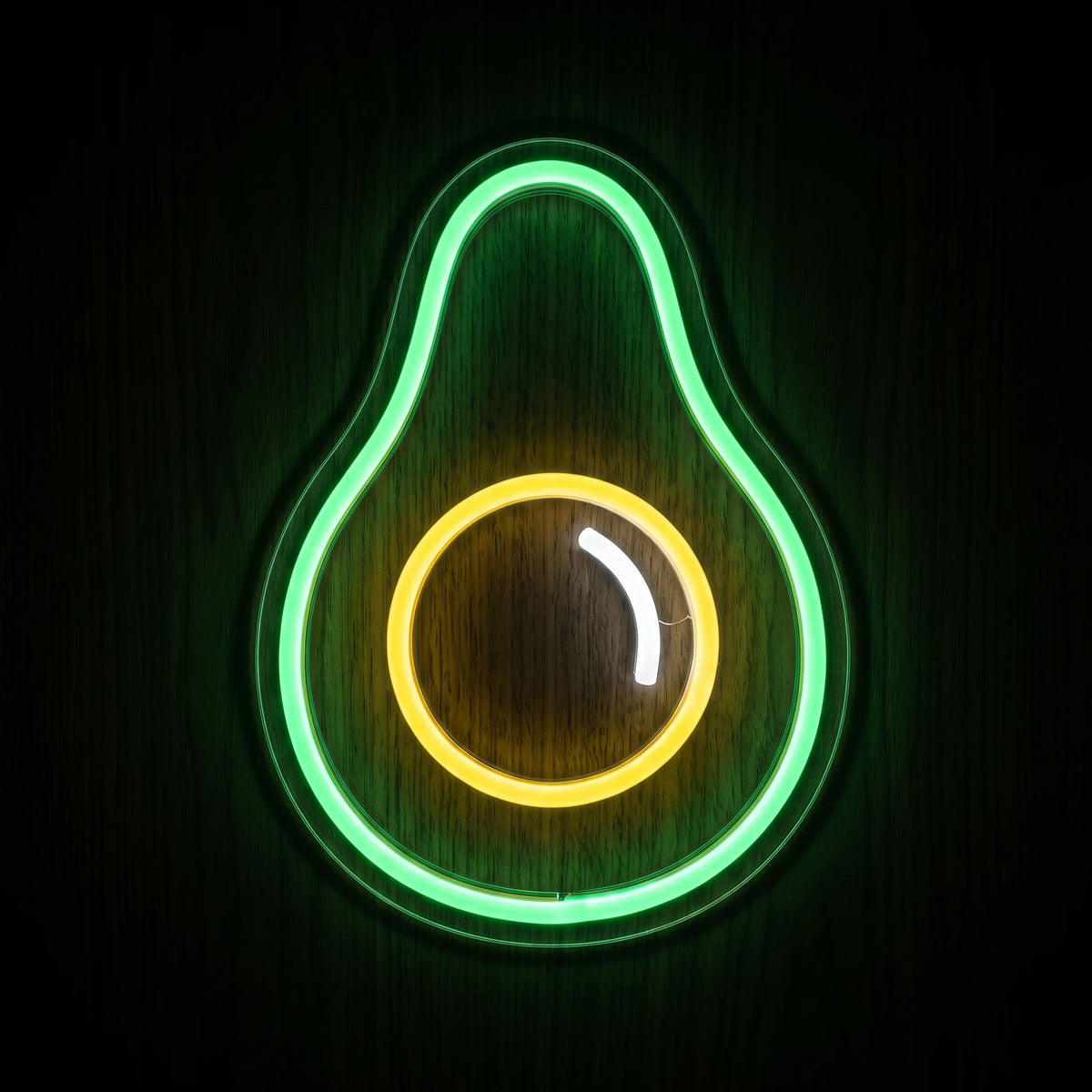 Avocado Half LED Neon Sign featuring a bright green avocado outline with a glowing yellow pit and white highlight.