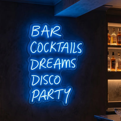 Photo of the 'BAR COCKTAILS DREAMS DISCO PARTY' neon sign glowing in deep blue against a styled interior wall.