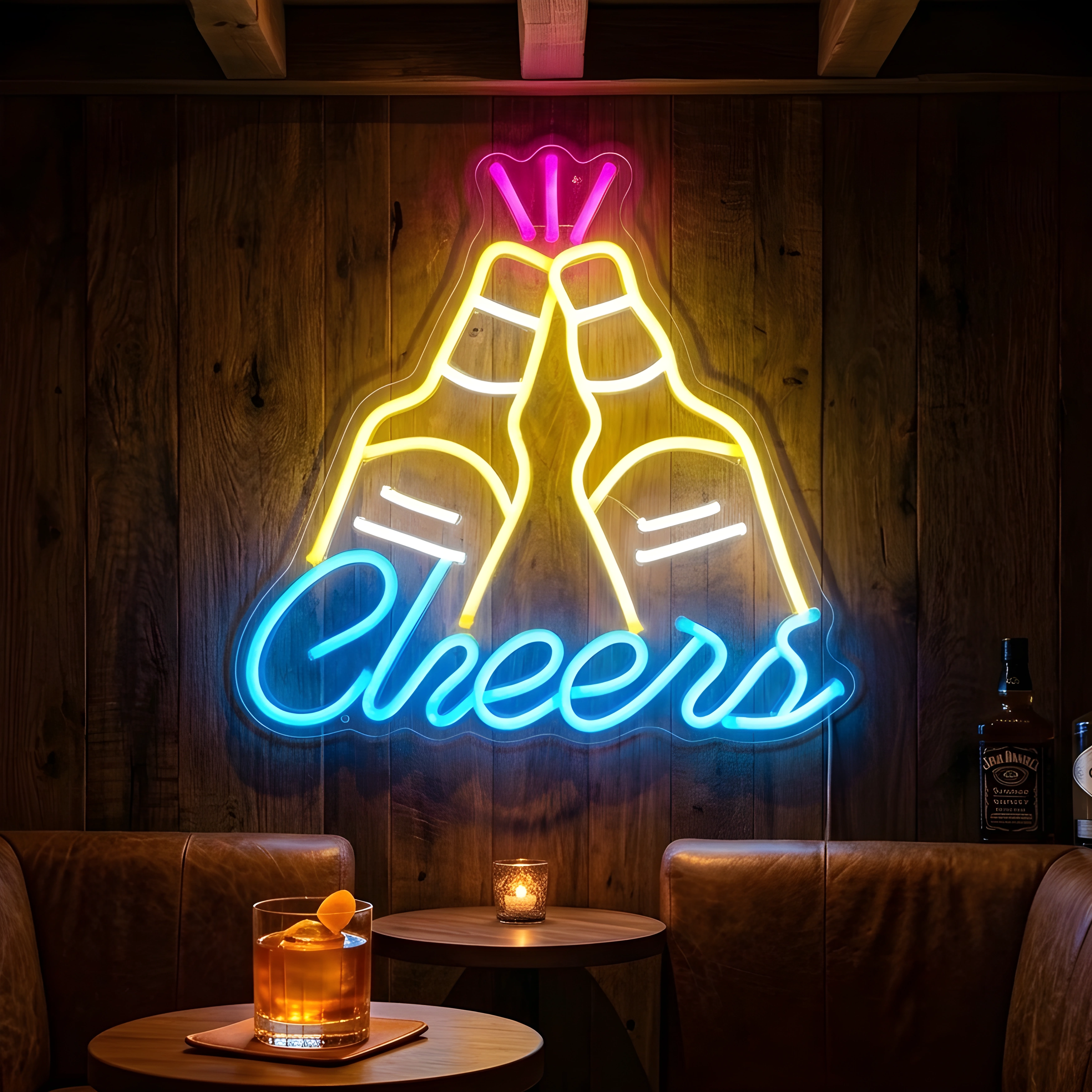 Photo of the 'CHEERS' neon sign glowing in multi-color against a styled interior wall.