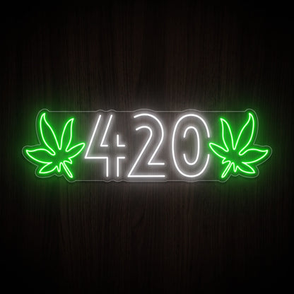 Classic 420 LED neon sign featuring white 420 numbers with green cannabis leaves on both sides mounted on a clear acrylic backing.