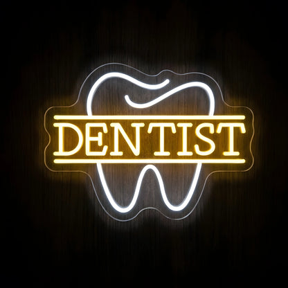 Classic Dentist Tooth LED neon sign featuring a cool white tooth outline behind golden-yellow DENTIST lettering and horizontal lines on clear acrylic backing for dental clinic wall decor.