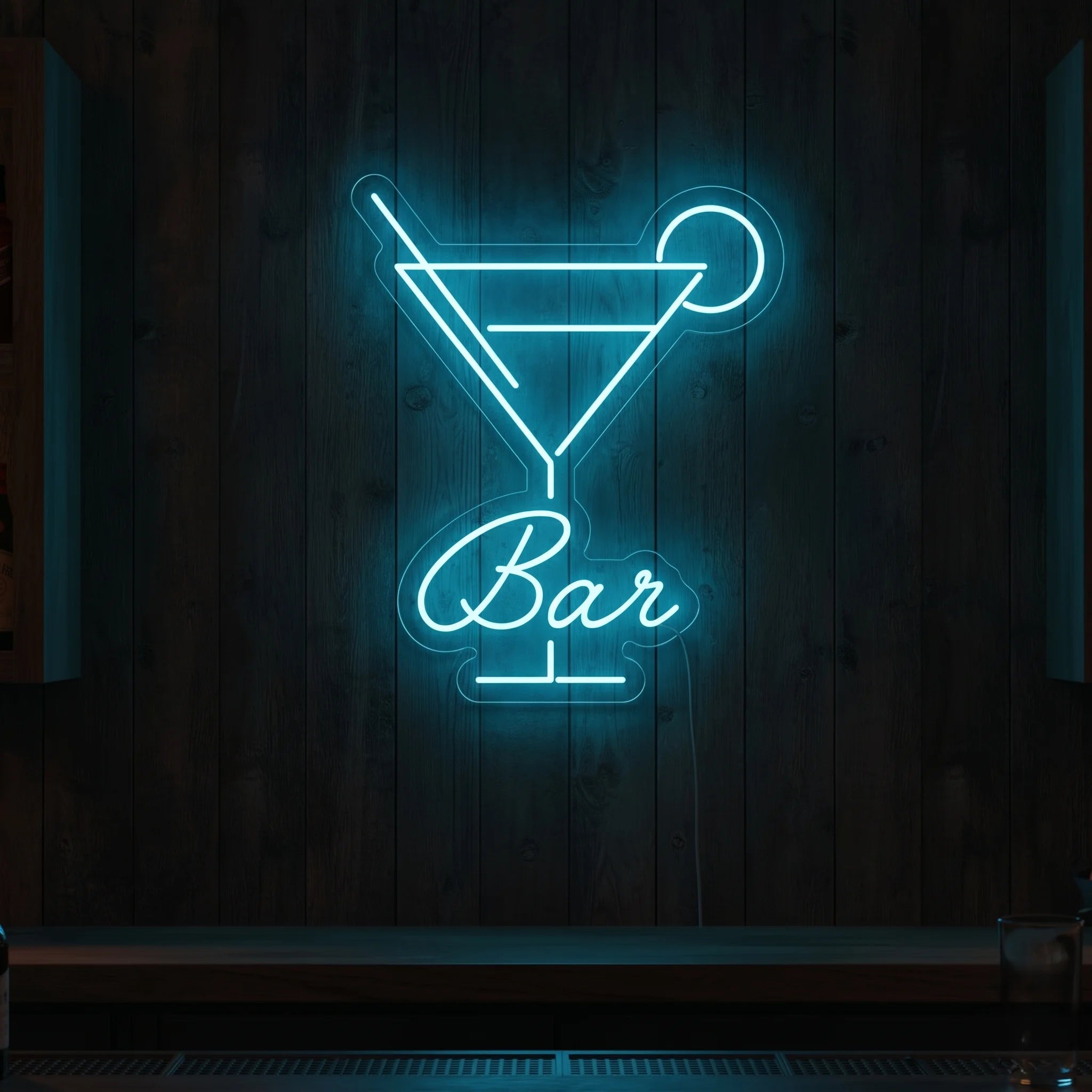 Photo of the 'BAR' neon sign glowing in ice blue against a styled interior wall.