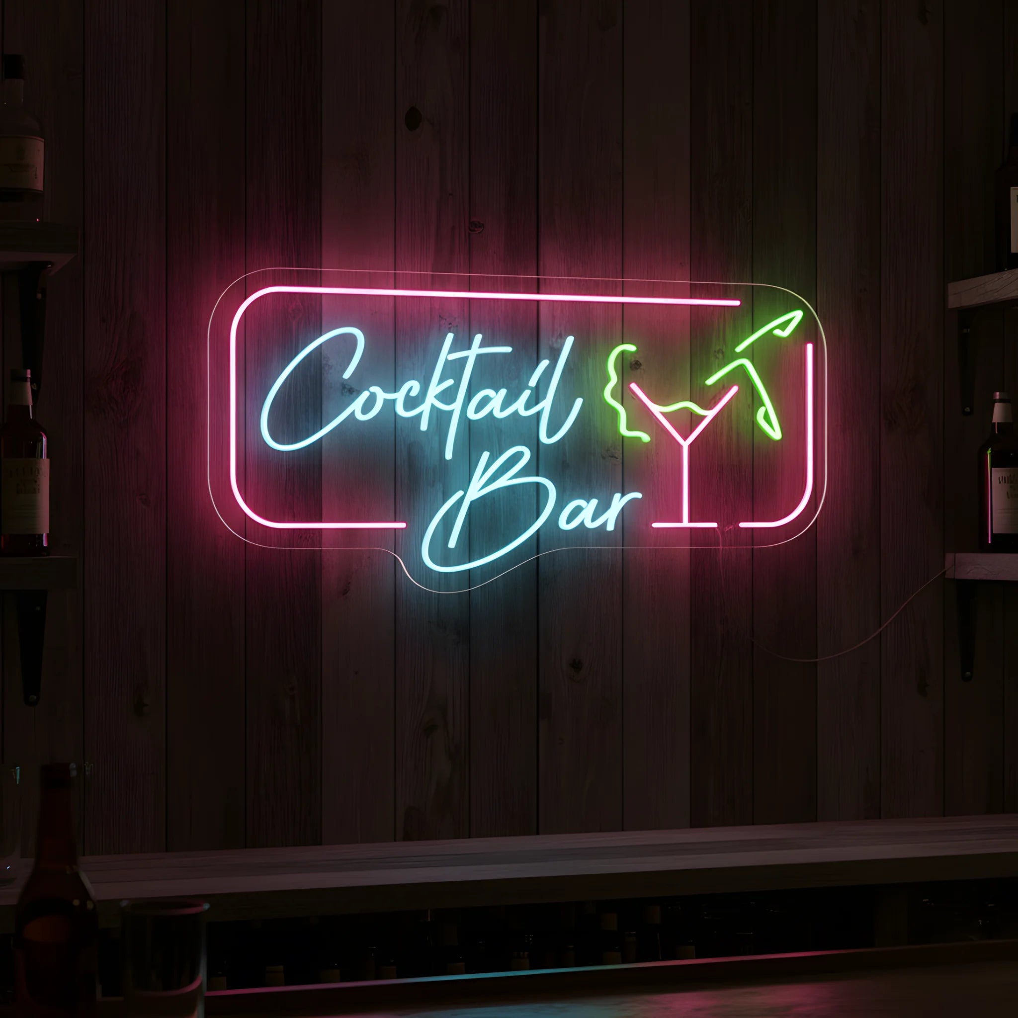 Photo of the 'COCKTAIL BAR' neon sign glowing in multi-color against a styled interior wall.