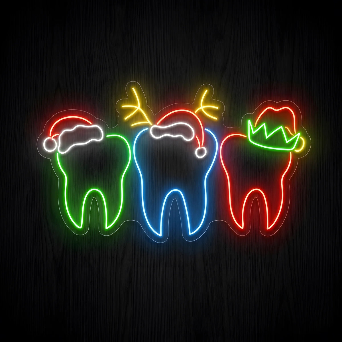 Colorful Christmas Teeth LED neon sign featuring green, blue, and red tooth outlines wearing Santa hats, reindeer antlers, and an elf hat on clear acrylic backing for dental clinic Christmas decor.