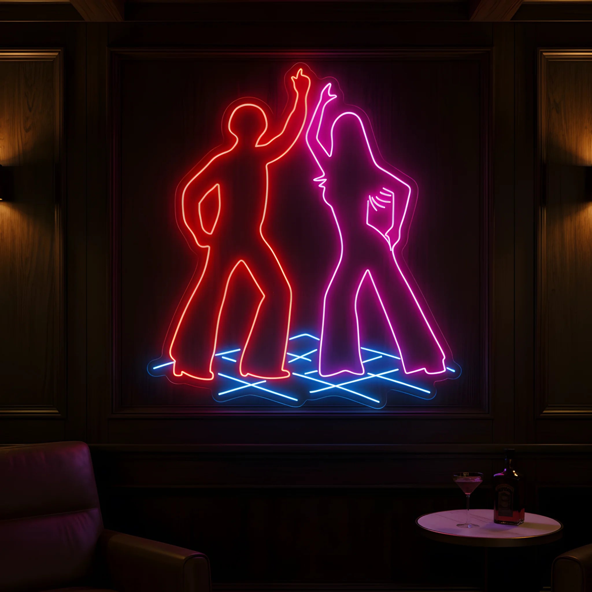 Photo of the 'Dancing Couple' neon sign glowing in multi-color against a retro disco-inspired wall.