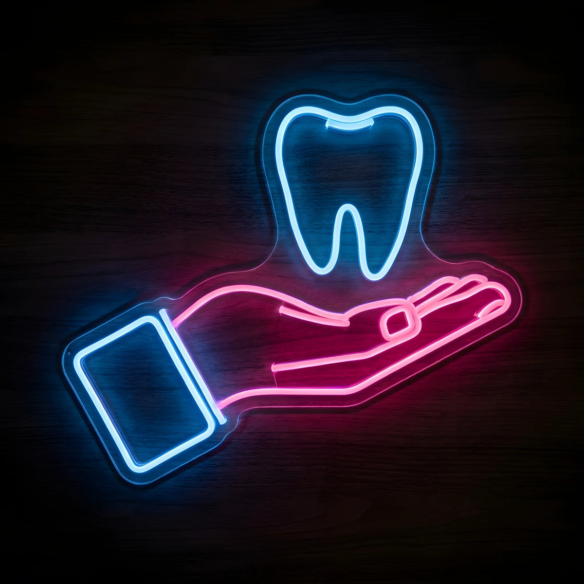 Dental Care Helping Hand LED neon sign featuring a glowing blue tooth above a pink open hand with blue sleeve on clear acrylic backing for dental clinic and dentist office wall decor.