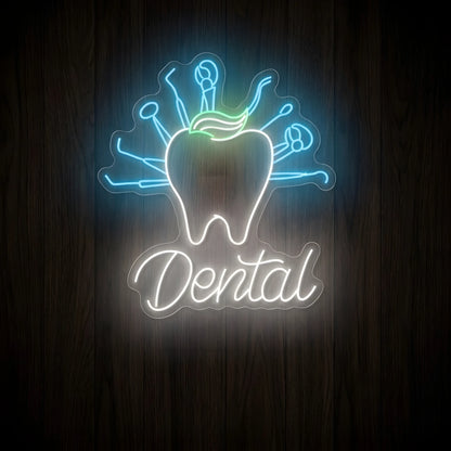 Dental Instruments Tooth LED neon sign featuring a cool white tooth with green accent, surrounding blue dental tools, and white Dental script lettering on clear acrylic backing for dental office decor.