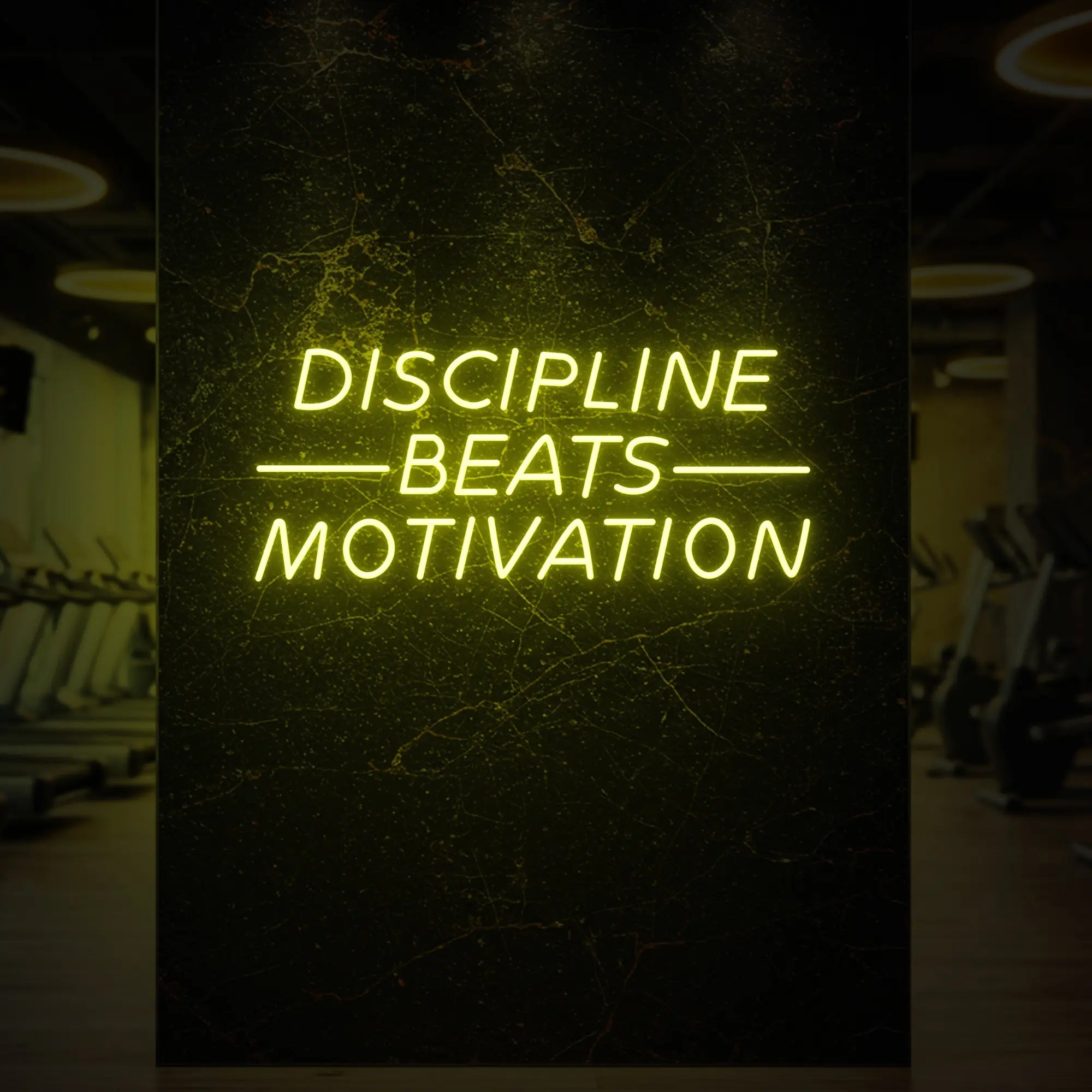  'Discipline Beats Motivation' neon sign glowing in lemon yellow against a styled interior wall.