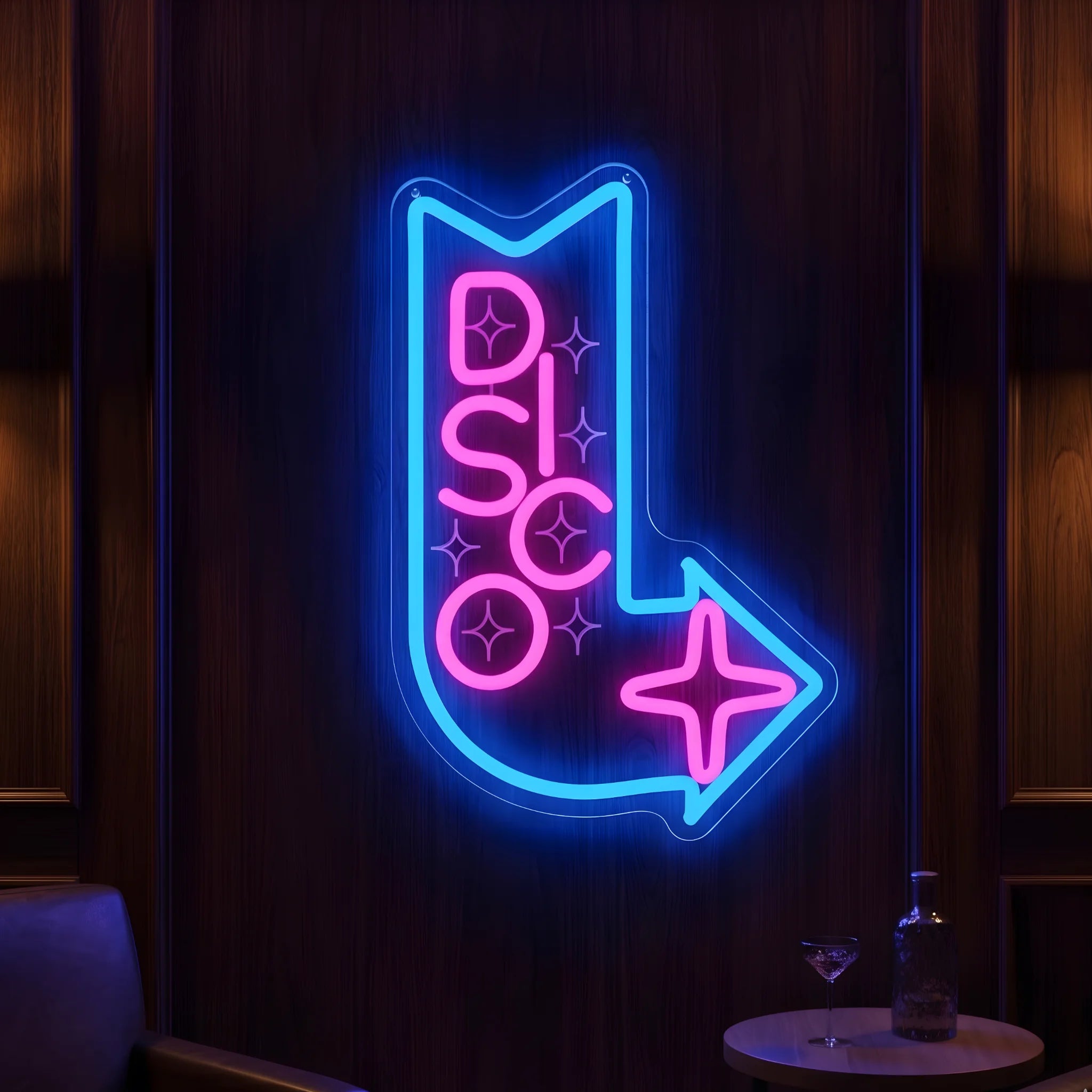 Photo of the 'Disco This Way' neon sign glowing in multi-color against a modern nightlife-inspired wall.