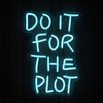 Do It For The Plot LED neon sign in bright cool blue on clear acrylic backing.