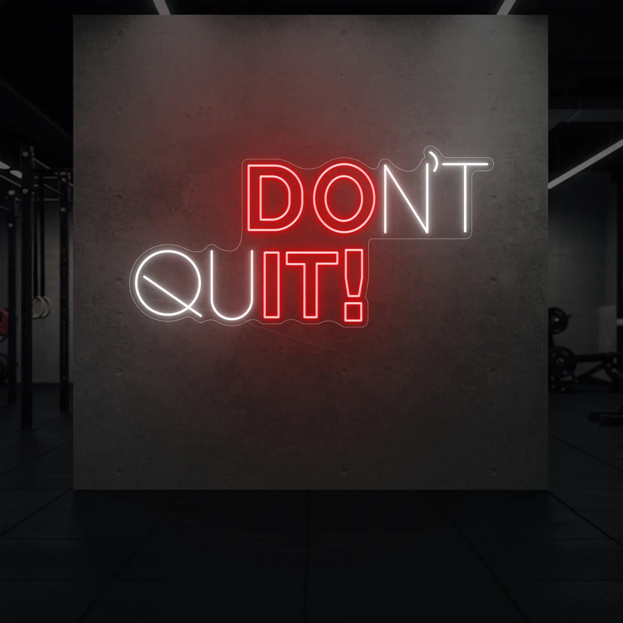 'Don’t Quit!' neon sign glowing in red against a styled interior wall.