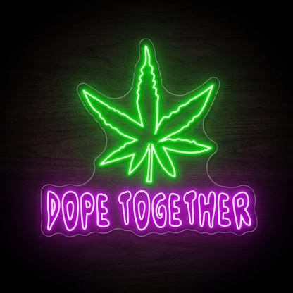 Dope Together LED neon sign with a bright green cannabis leaf, purple-pink lettering, and clear acrylic backing for cannabis wall décor.