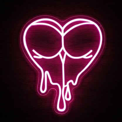 Dripping heart LED neon sign with vivid pink illumination on clear acrylic backing.