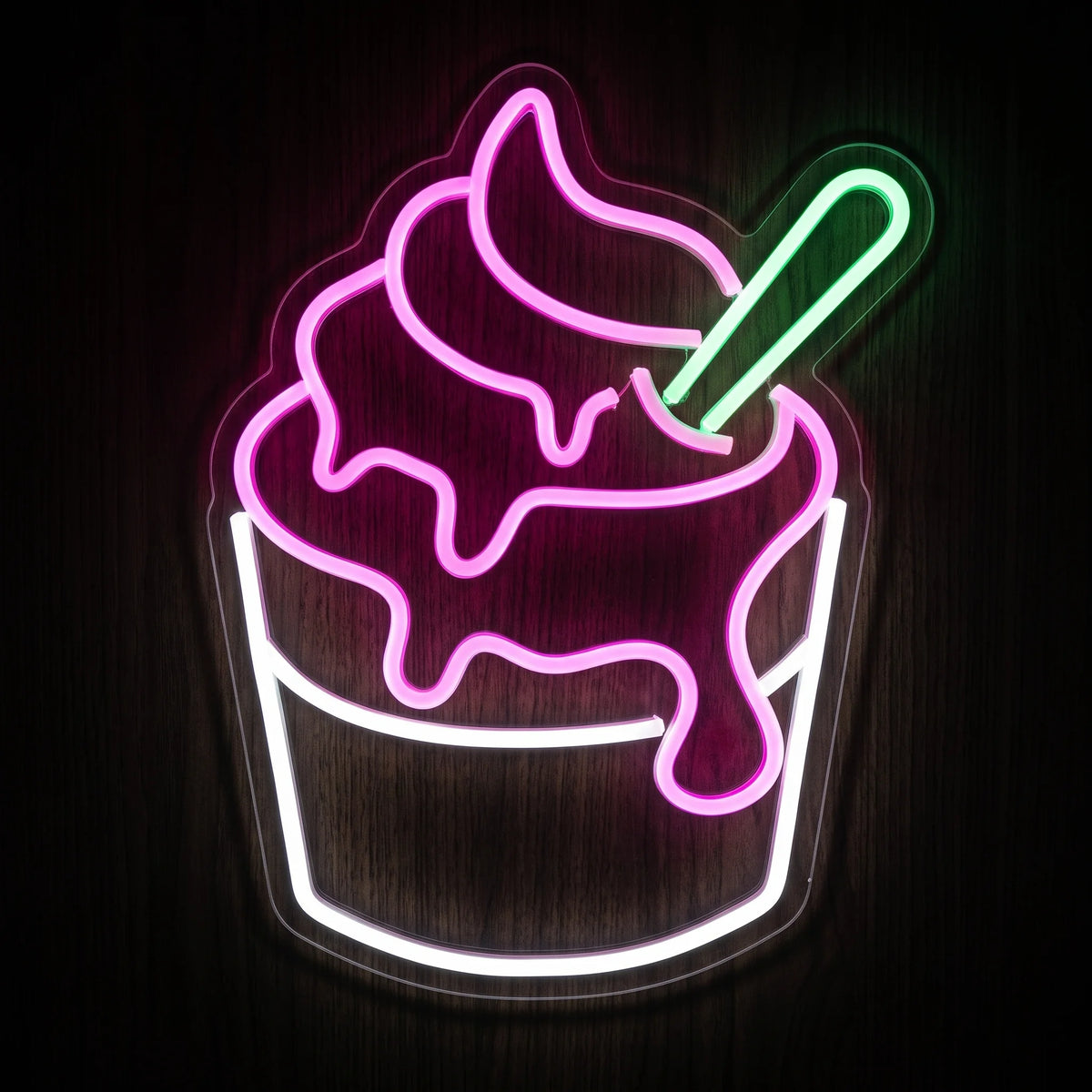 Dripping sundae LED neon sign with pink soft serve, white dessert cup, green spoon, and clear acrylic backing.
