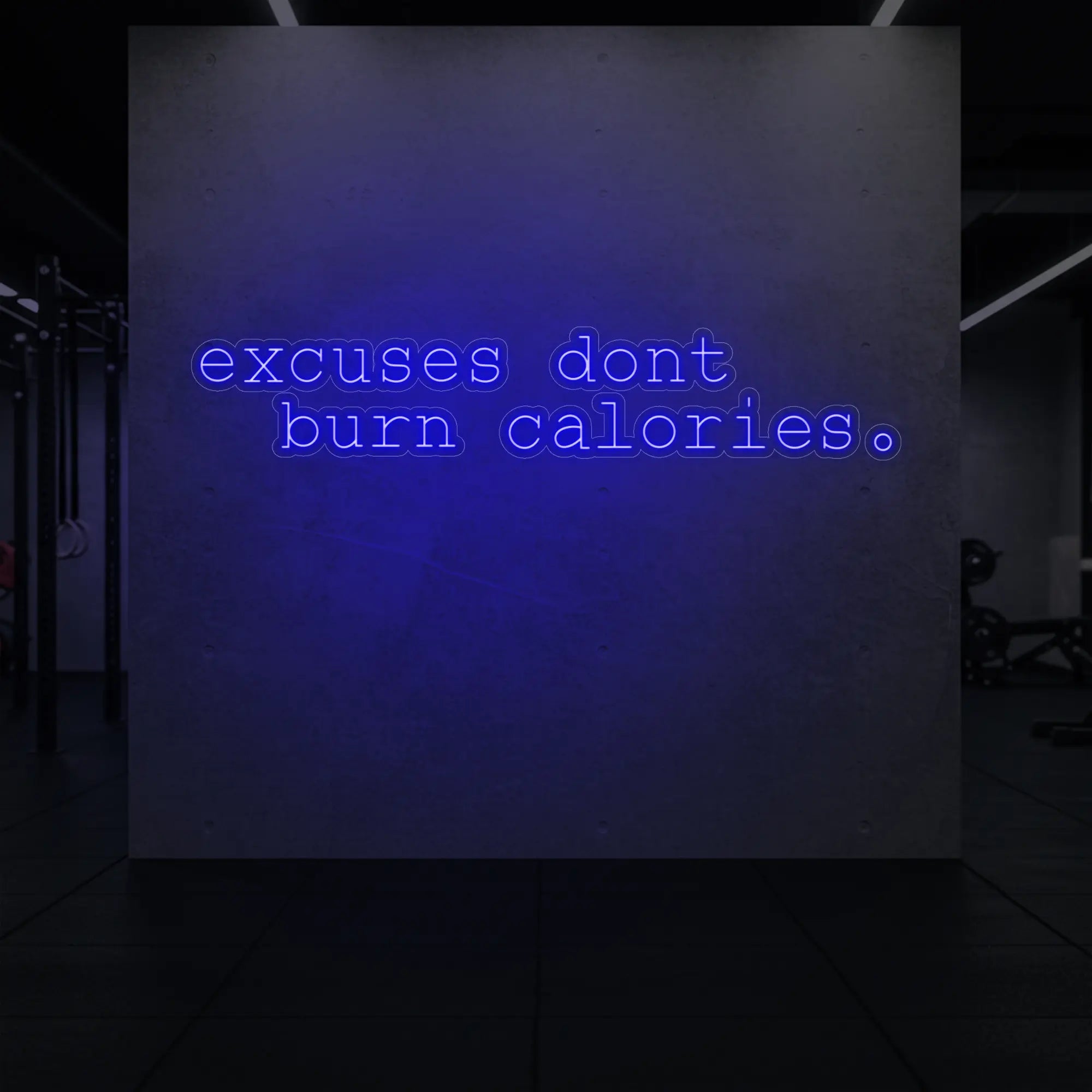  'Excuses Don’t Burn Calories' neon sign glowing in deep blue against a styled interior wall.