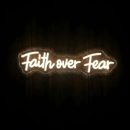 Faith Over Fear LED neon sign with warm white illumination on precision-cut acrylic backing, Christian wall decor featuring an inspirational faith message.