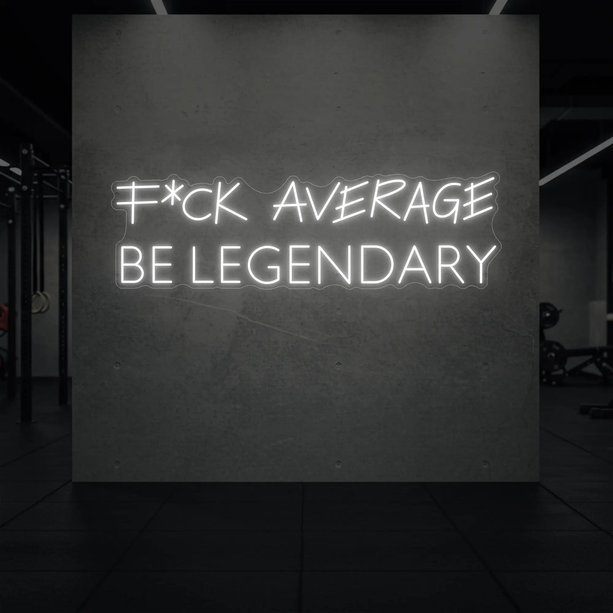  'F*ck Average Be Legendary' neon sign glowing in cool white against a styled interior wall.
