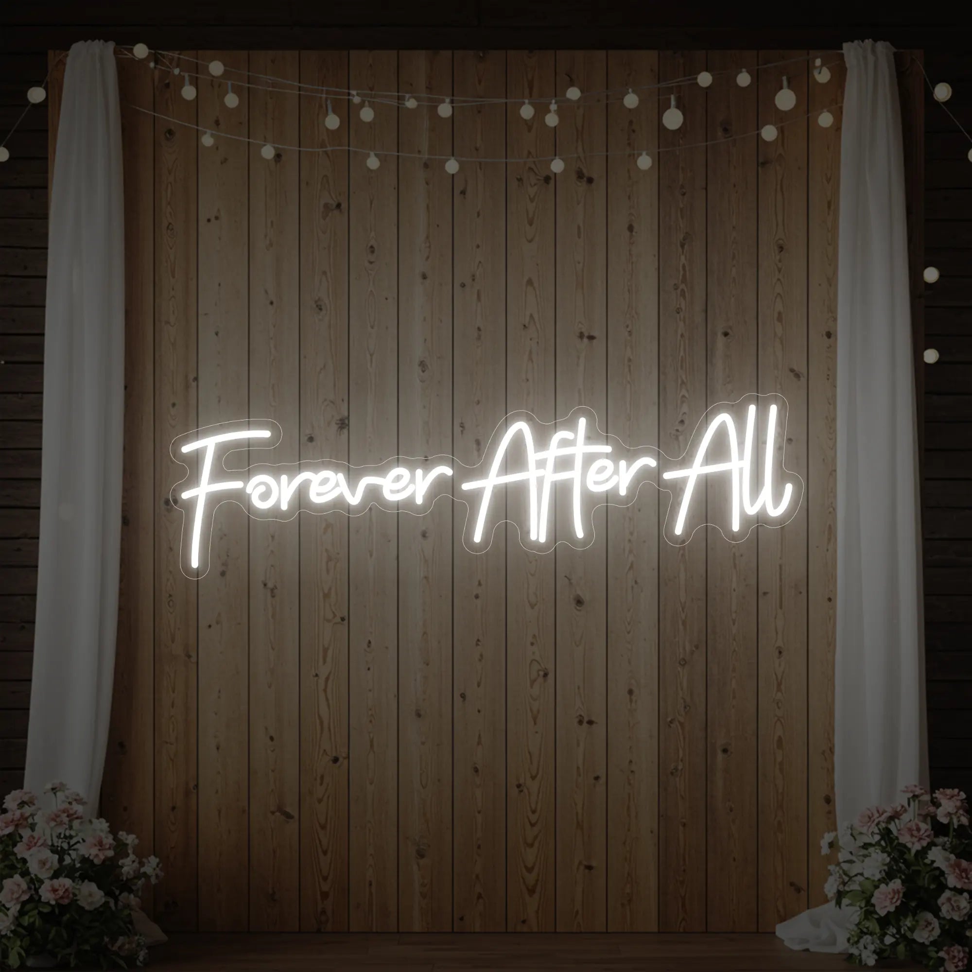Photo of the 'Forever After All' neon sign glowing in cool white against a styled interior wall.