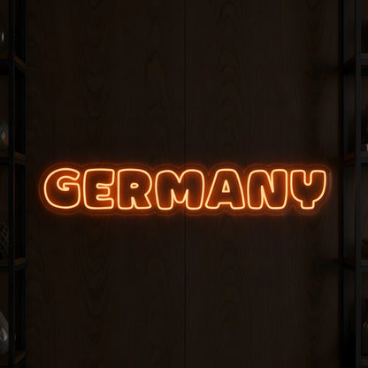 Germany script LED neon sign featuring warm amber illuminated lettering