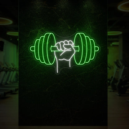  'Hand Holding a Weight' neon sign glowing in green against a styled interior wall.