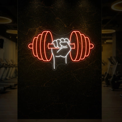  'Hand Holding a Weight' neon sign glowing in golden yellow against a styled interior wall.