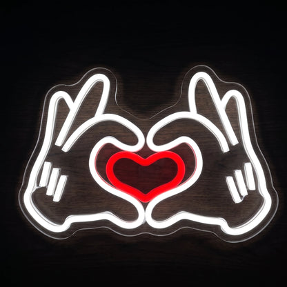 Heart Hands LED Neon Sign with white hand outlines forming a heart around a glowing red heart.