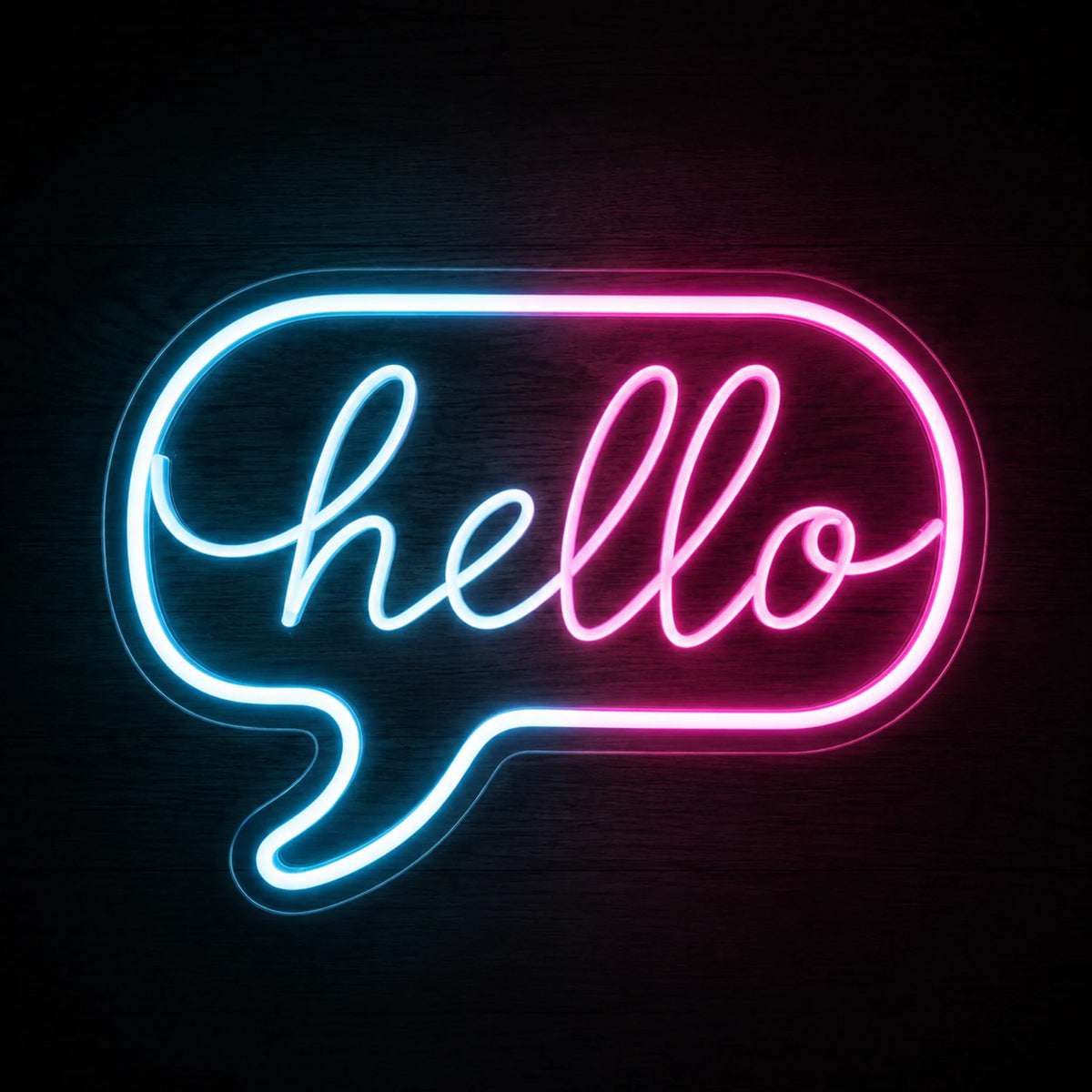 Hello Speech Bubble LED neon sign featuring cursive hello lettering inside a glowing blue and pink speech bubble on clear acrylic.