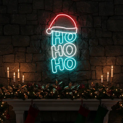 Photo of the 'Ho Ho Ho V1' neon sign glowing in Multicolor against a styled interior wall.
