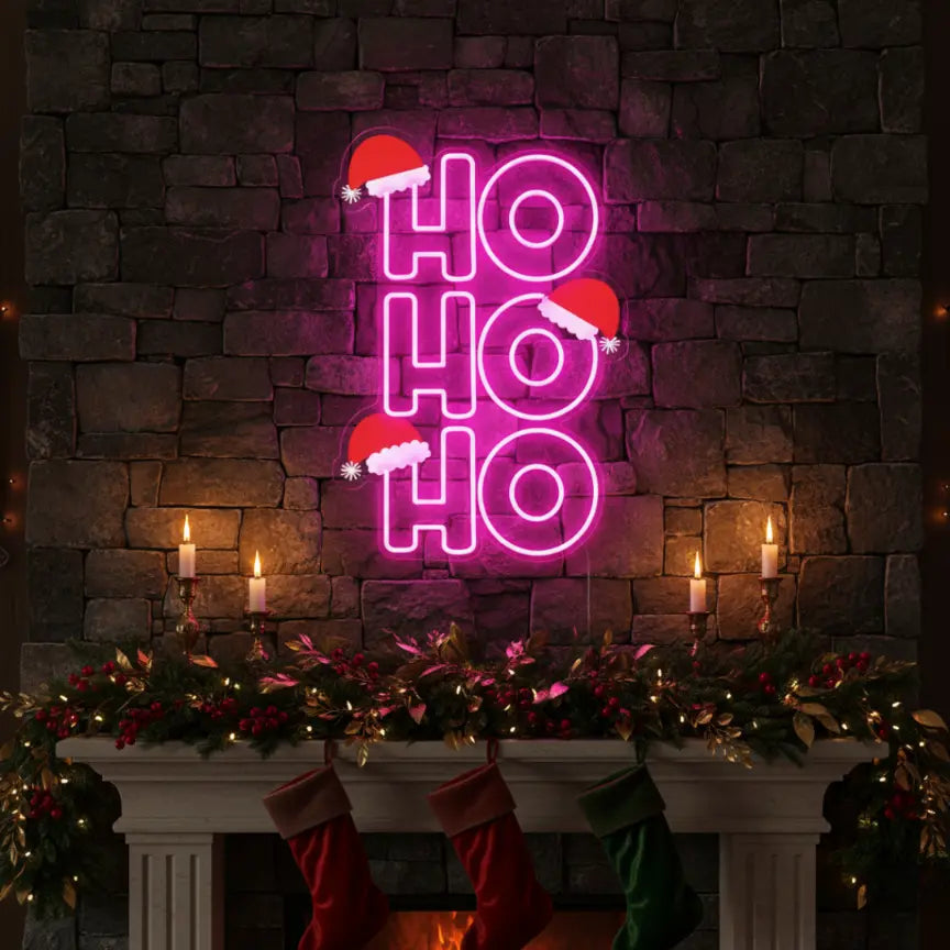 Photo of the 'Ho Ho Ho V3' neon sign glowing in multicolor against a styled interior wall.