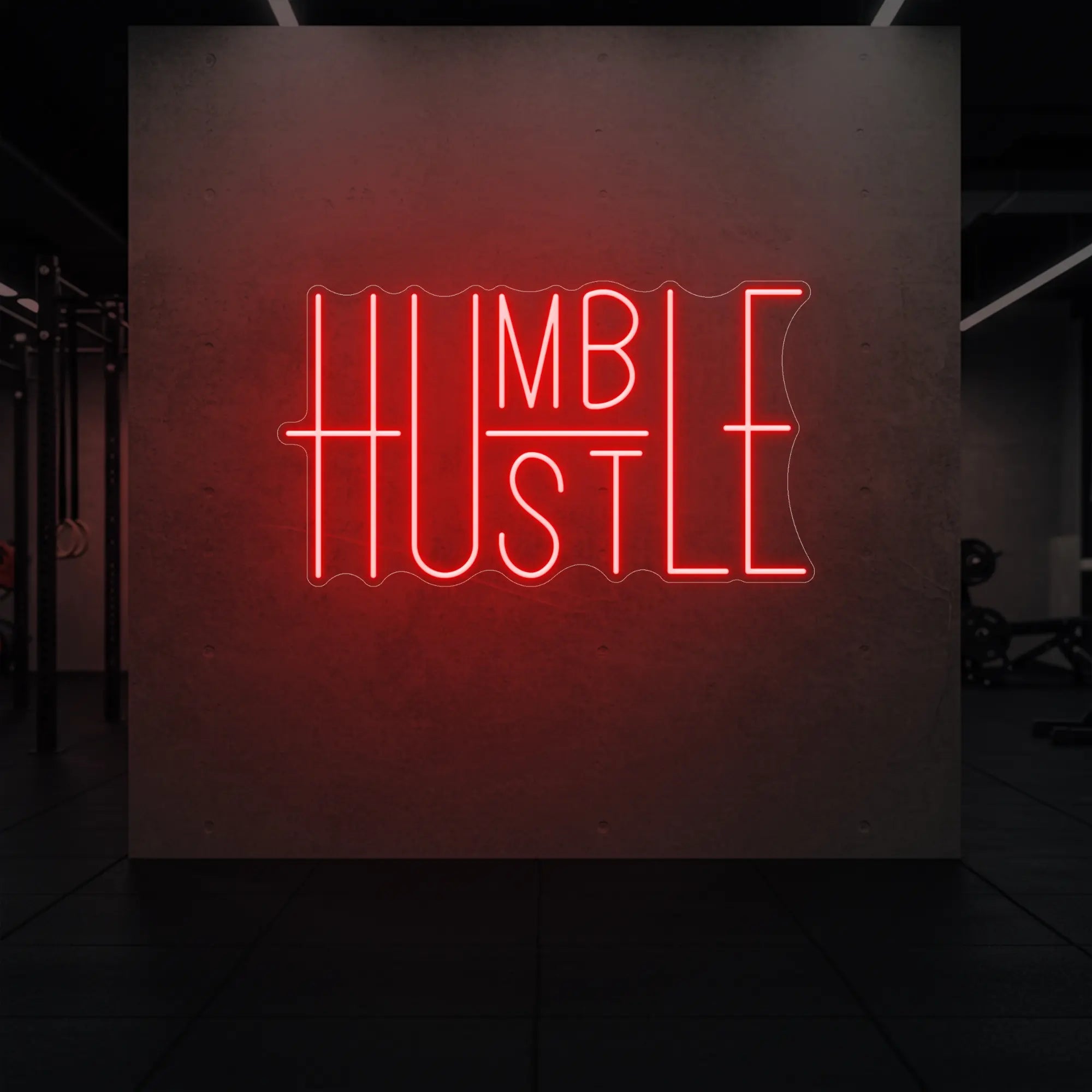  'Humble Hustle' neon sign glowing in red against a styled interior wall.