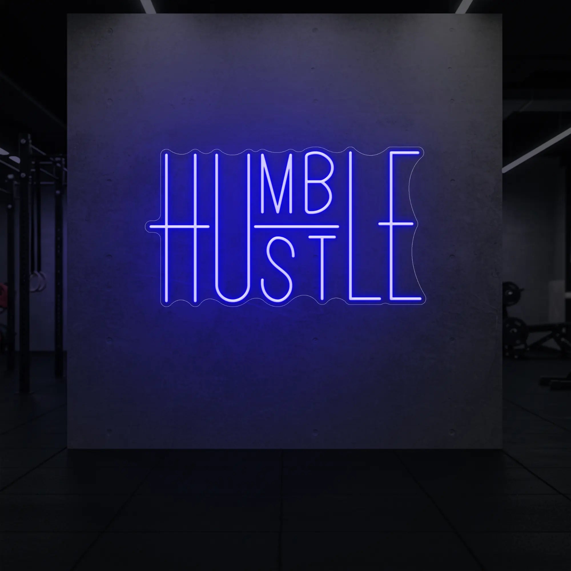 'Humble Hustle' neon sign glowing in deep blue against a styled interior wall.