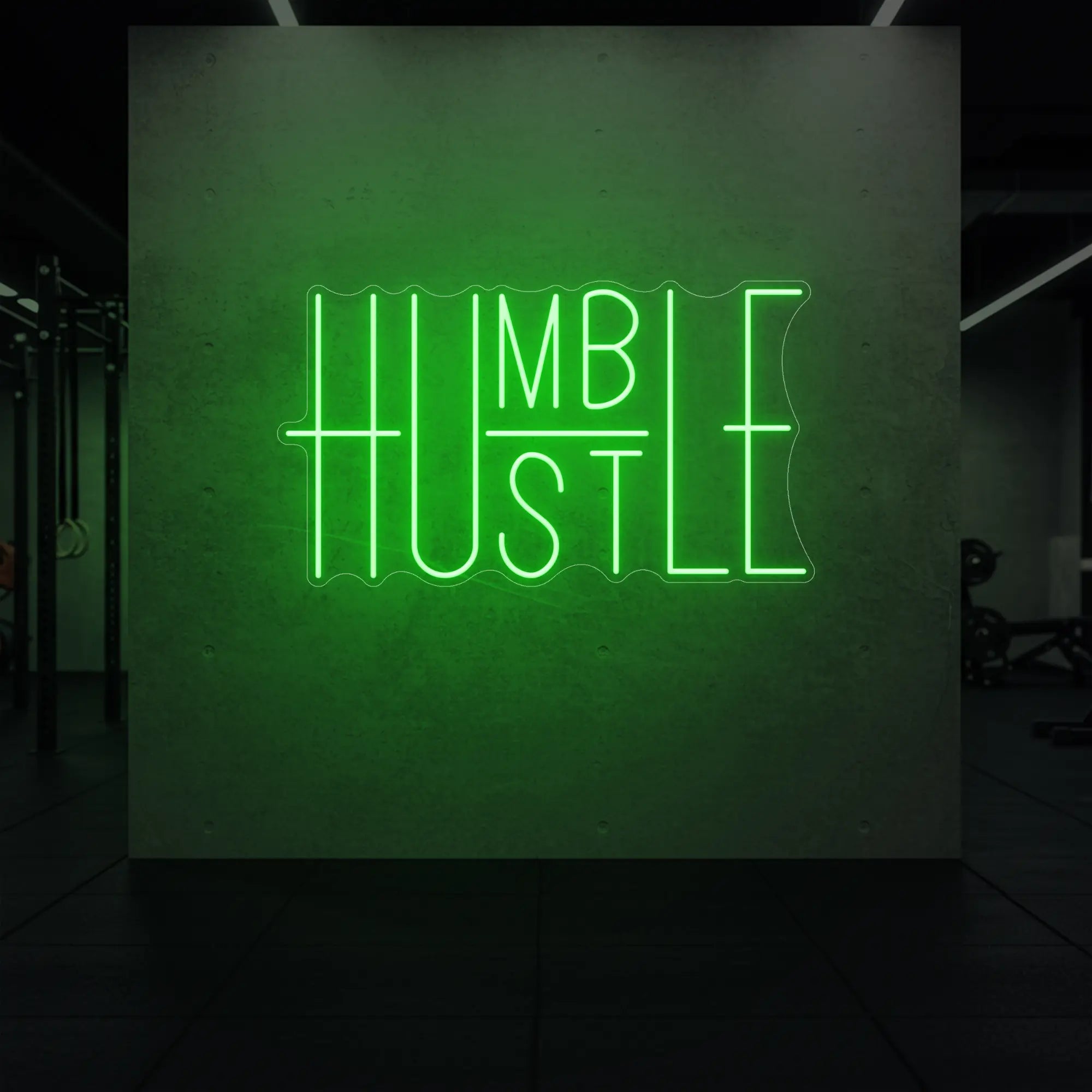 'Humble Hustle' neon sign glowing in green against a styled interior wall