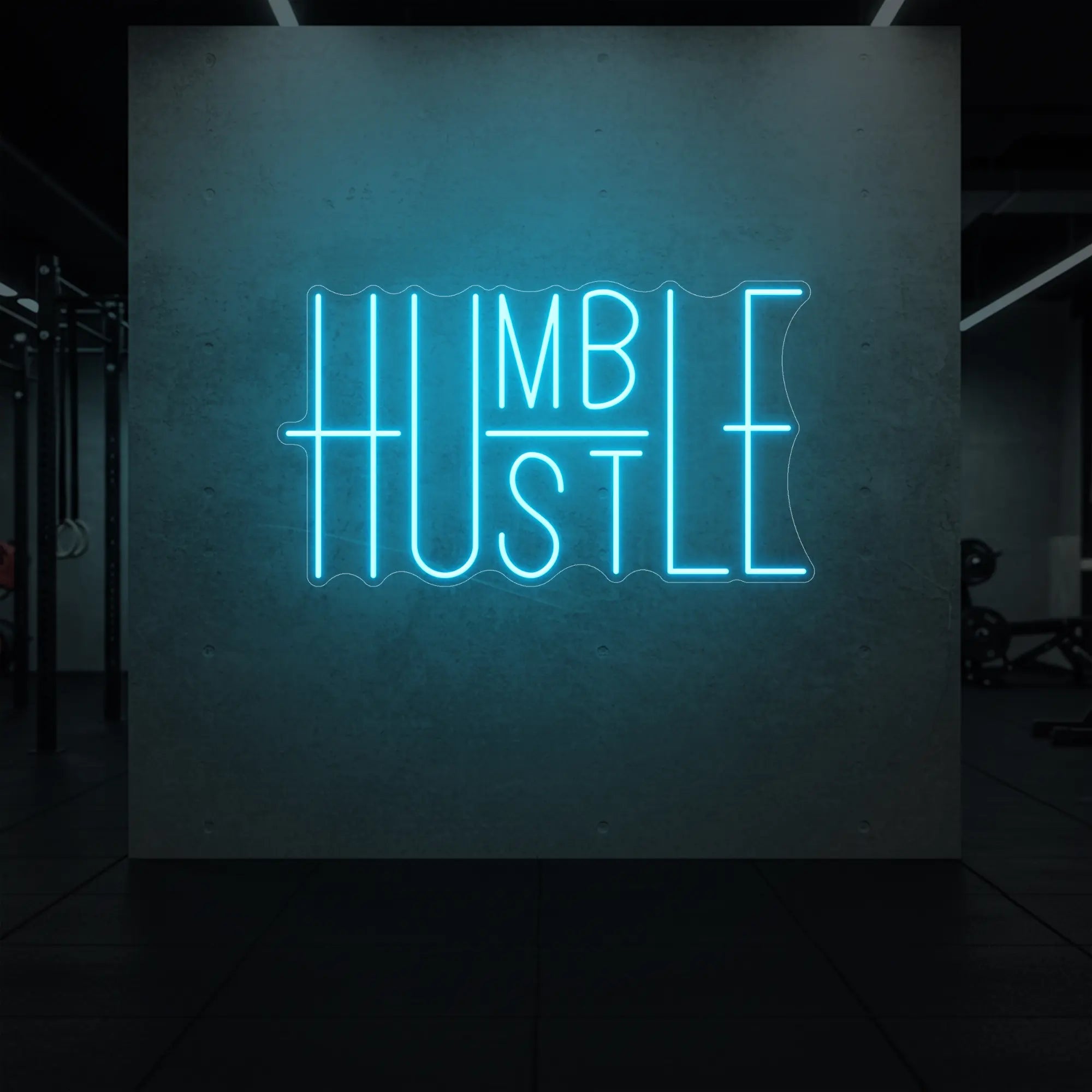 'Humble Hustle' neon sign glowing in ice blue against a styled interior wall.