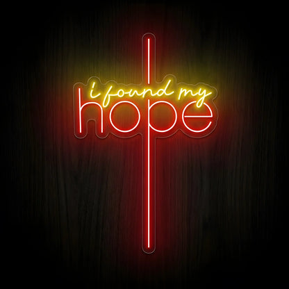 I Found My Hope LED neon sign featuring a glowing red cross with warm yellow script on a precision-cut clear acrylic backing for Christian wall decor.