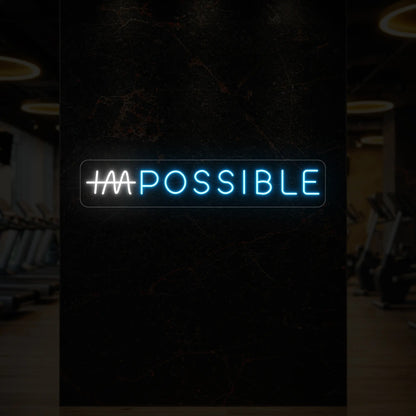  'IMPOSSIBLE' neon sign with the “IM” crossed out, glowing in ice blue and cool white against a styled interior wall.
