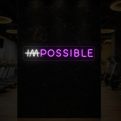 'IMPOSSIBLE' neon sign with the “IM” crossed out, glowing in deep pink and cool white against a styled interior wall.