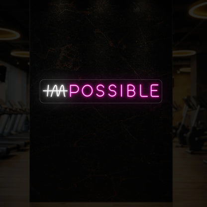  'IMPOSSIBLE' neon sign with the “IM” crossed out, glowing in light pink and cool white against a styled interior wall.