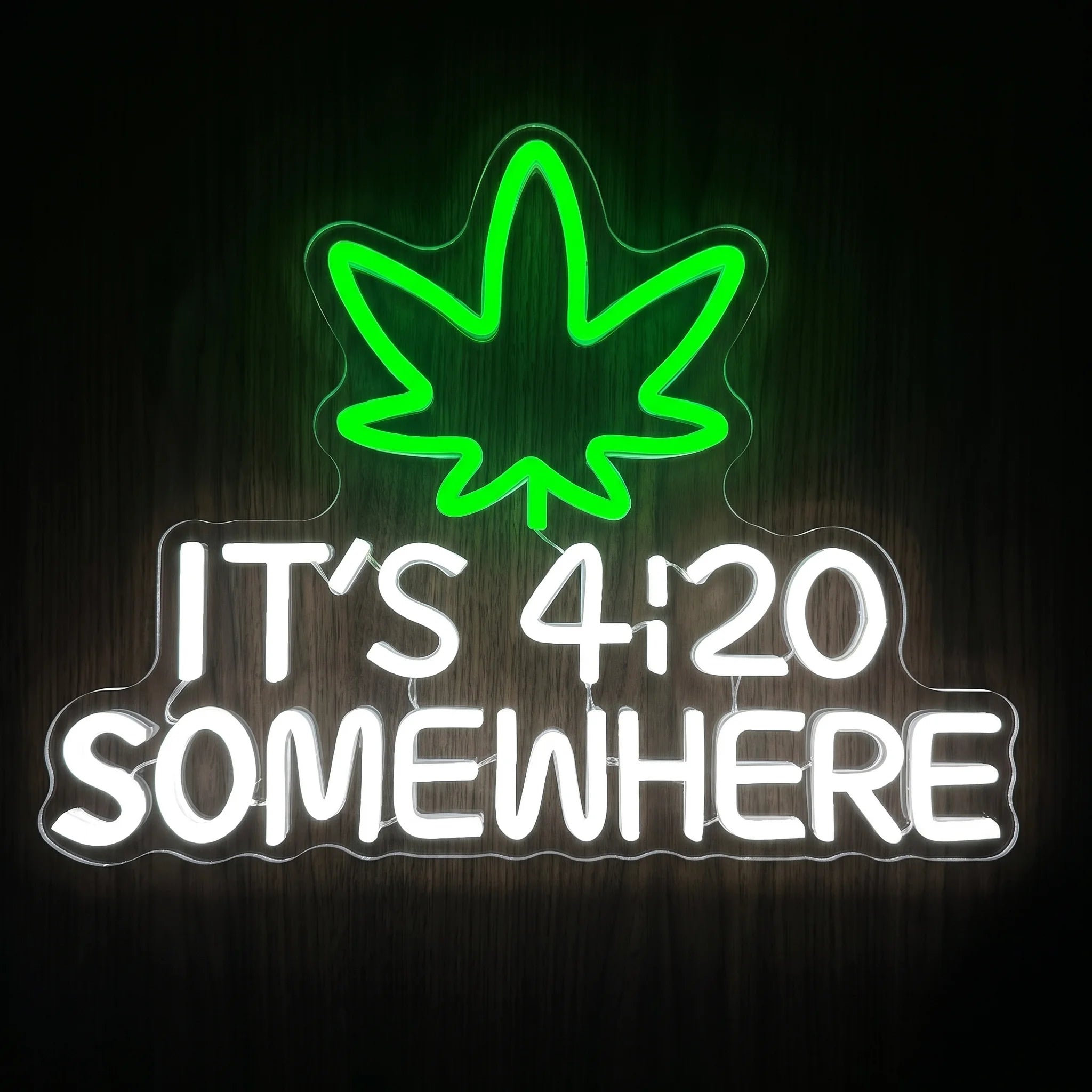 It's 4:20 Somewhere LED neon sign on clear acrylic backing featuring a green cannabis leaf with bright white lettering for cannabis wall décor.