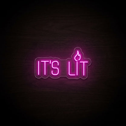 It's Lit LED Neon Sign featuring bright pink IT'S LIT lettering with a small glowing flame icon.