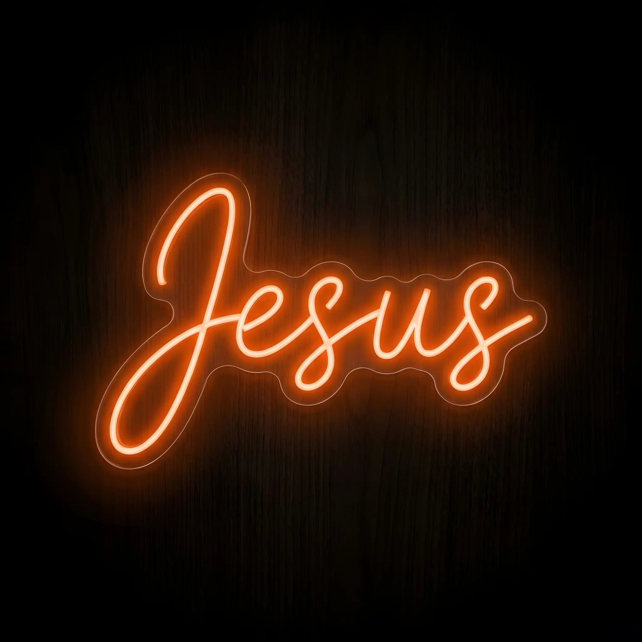 Jesus LED neon sign with warm amber illumination on precision-cut acrylic backing, Christian wall decor featuring the name of Jesus in elegant script.